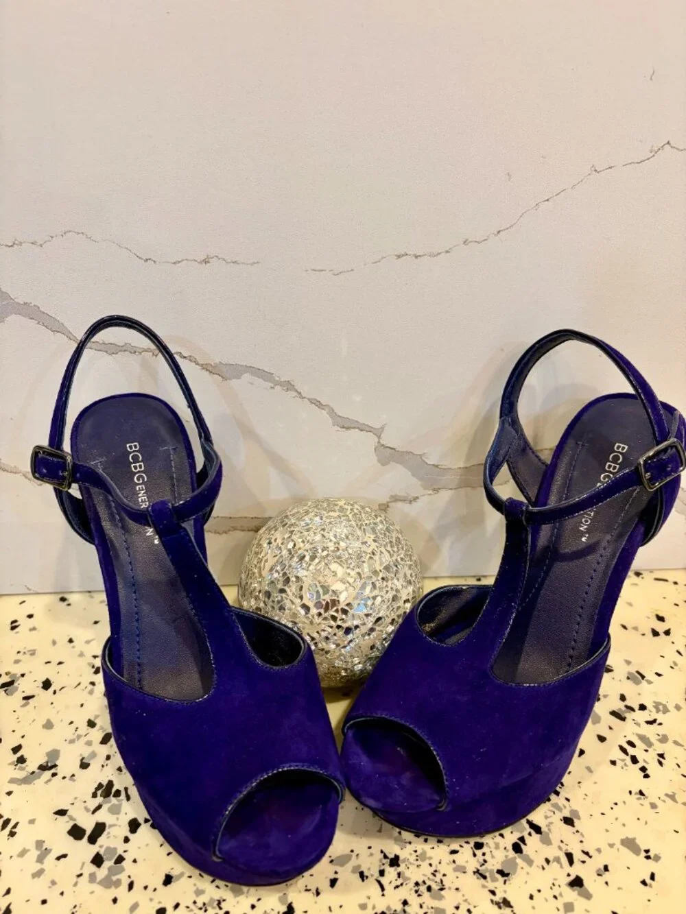 Suede Blue 7 1/2, excellent condition strap on shoe.